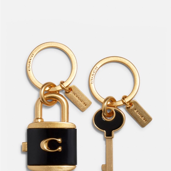 Coach Accessories - Coach lock and key keychain nwt,gold and black.